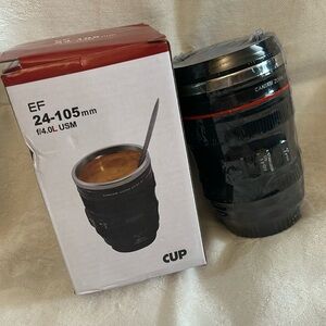 Camera lens travel cup